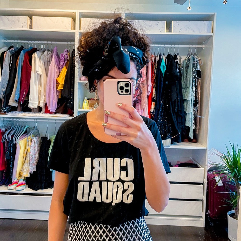 Black T-shirt curly hair